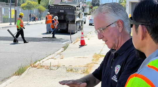 Council President Krekorian with LADOT crew installing speed hump.